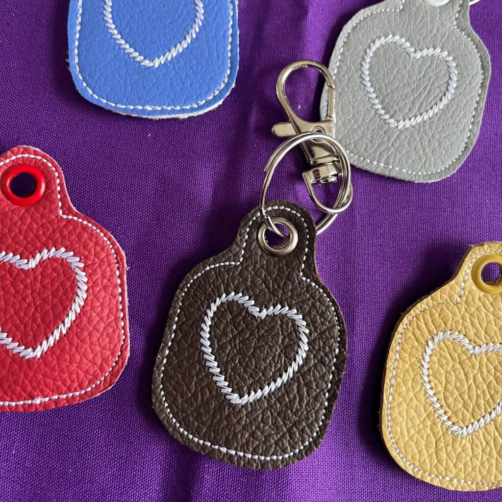 In The Hoop Trolley/Coin Holder Snap Tab and Eyelet Version Digital